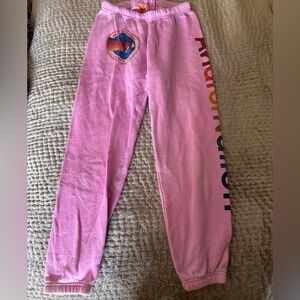 Aviator Nation pink sweatpants with aviator nation label on the leg. Size XS